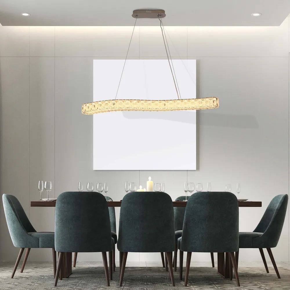 Elegant crystal chandelier illuminating a modern dining room with minimalist decor, enhancing the sophisticated ambiance.159-18348