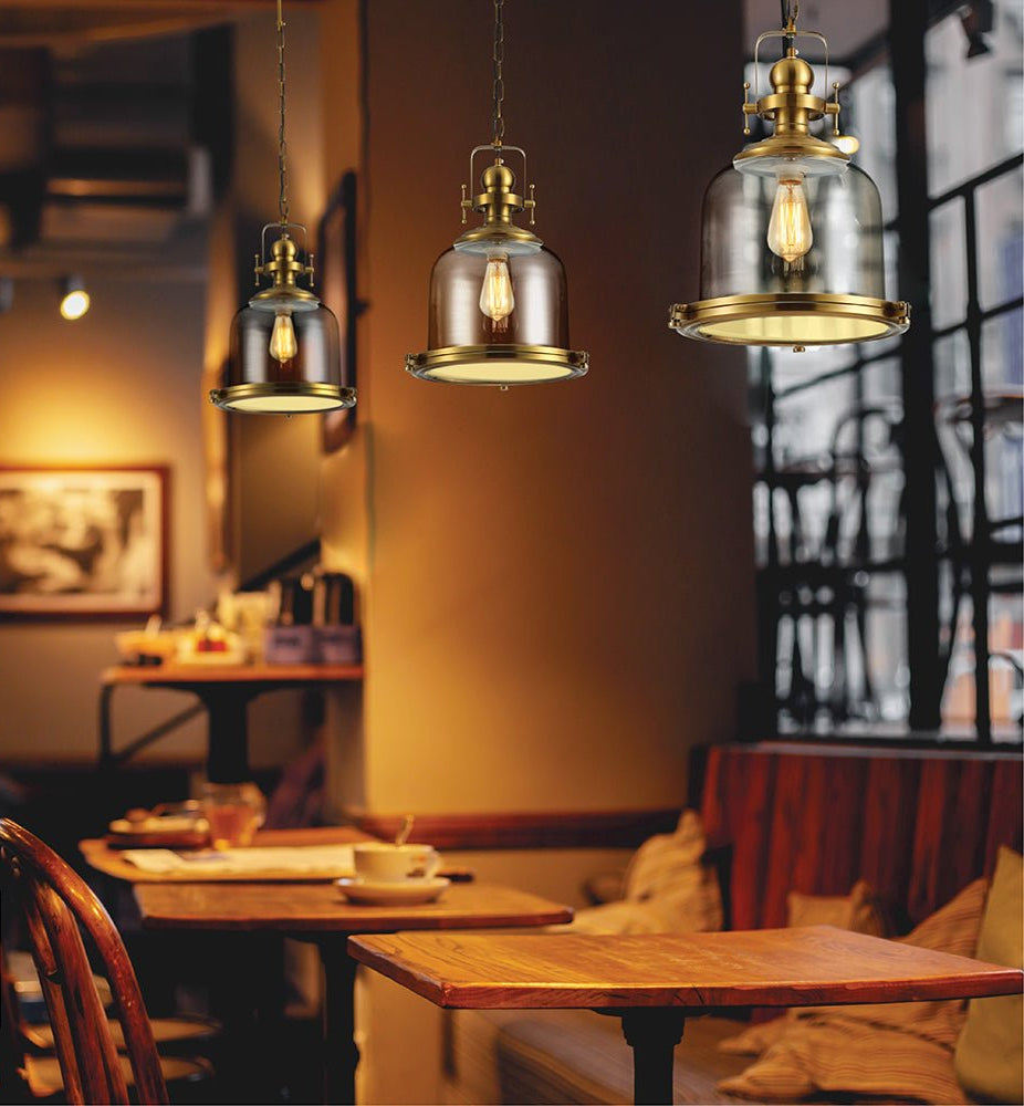 Golden bronze metal amber glass cylinder pendant light sealed with e27 fitting in indoor setting cafe pub