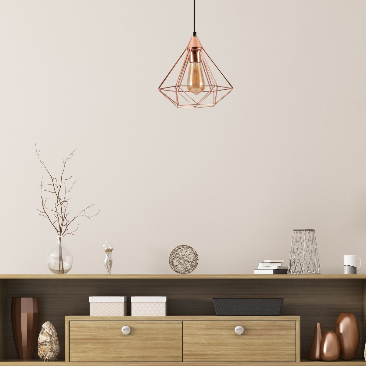 Rose gold metal cage pendant light l with e27 fitting in indoor setting dining room