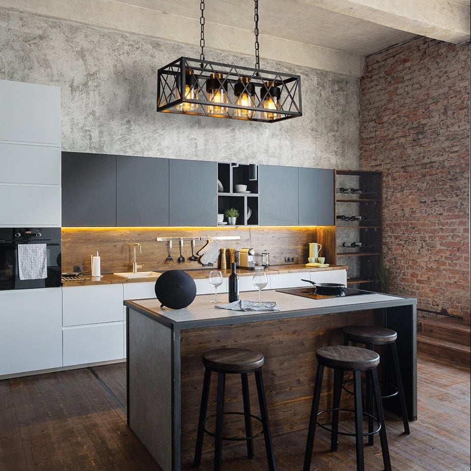 Black cuboid metal amber cylinder glass island chandelier with 4xe27 fitting in indoor setting island kitchen