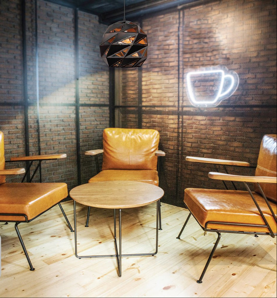 Black-golden metal polyhedral pendant light l with e27 fitting in an indoor setting foyer lobby